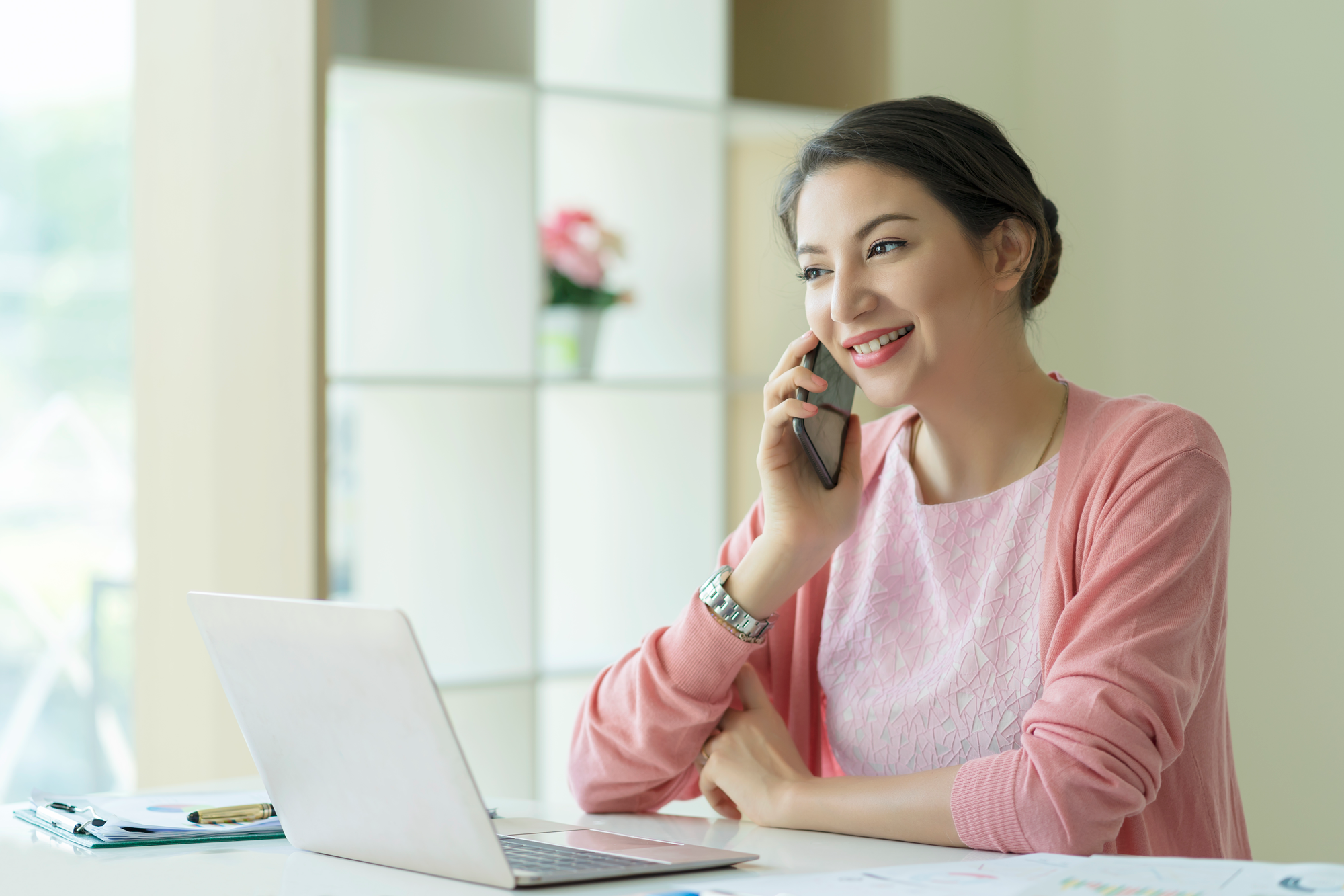 A woman on a a phone interview